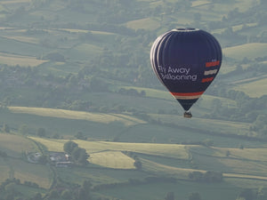 Fly Away Ballooning hot air balloon flying over the Devon countryside near Tiverton