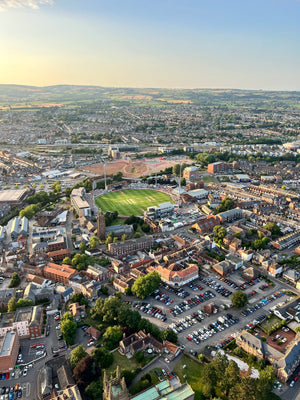 Aerial view of Taunton town and Somerset County Cricket Ground seen from a hot air balloon